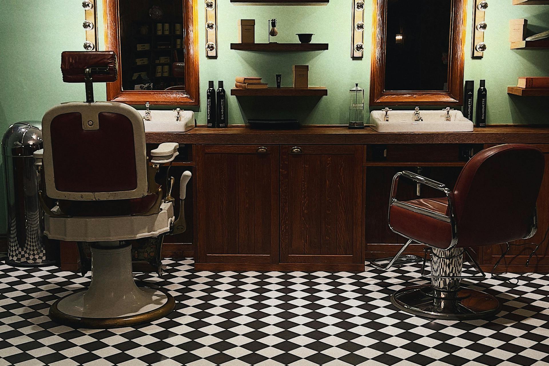 Polished barber chair, TriBeCa loft lighting, wood and brass